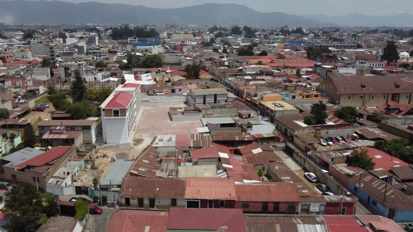 Flyover: Quaint city streets of historic old Quetzaltenango, Guatemala Royalty-Free Stock Footage #1108241723