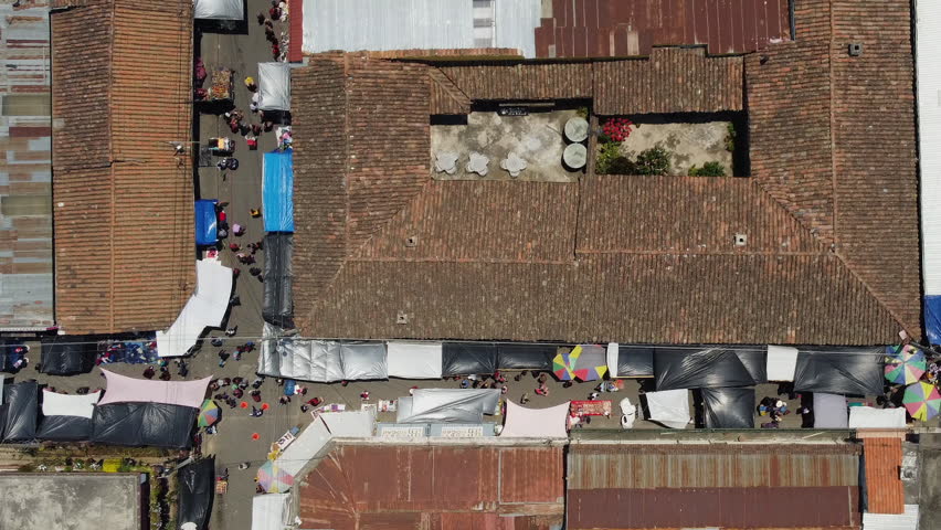 Visitors, shoppers crowd to Quetzaltenango Guatemala street market Royalty-Free Stock Footage #1108246375