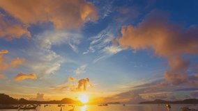 time lapse amazing Bright pink red light dazzle the sky above the island.
Majestic sunset or sunrise landscape Amazing light of nature cloudscape sky. 
clouds in beautiful gradient sunrise.