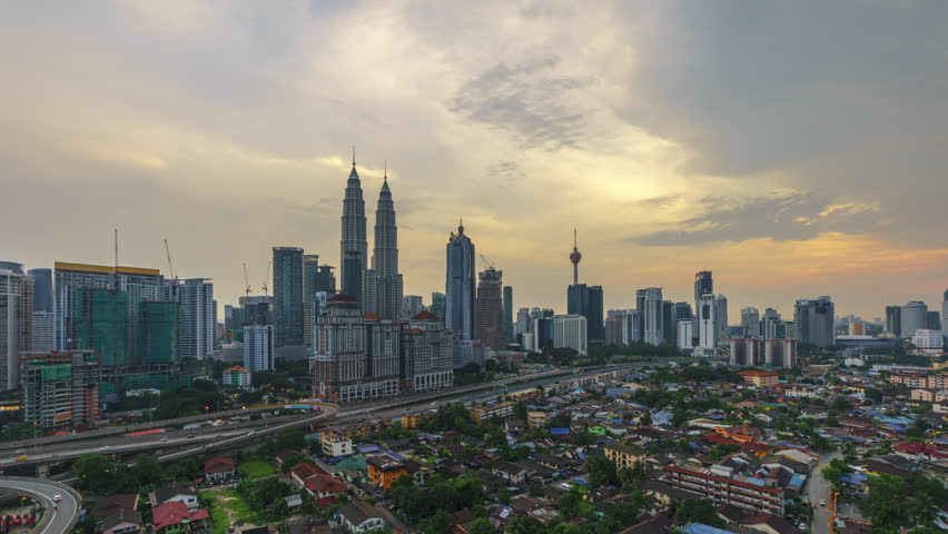 Sunset Time lapse: Time lapse: Kuala Lumpur view during dusk overlooking a skyline in Malaysia.  Zoom in motion timelapse. High quality, No Logo. Prores 4KUHD.