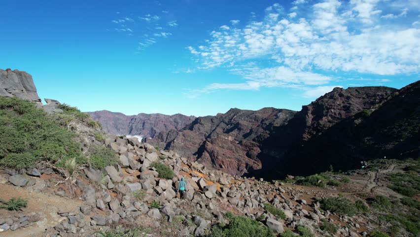 Aerial fly over above the clouds at Pico de La Nieve at the top of the Caldera de Taburiente National Park in La Palma - Canary Islands