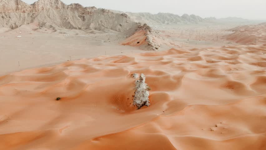 Aerial Footage drone Sharjah Dubai desert in United Arab Emirates during sunset