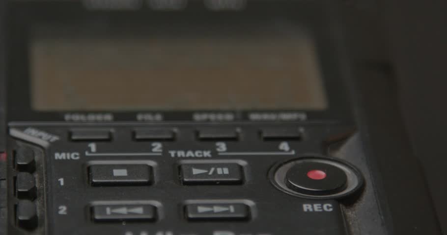 Close up of finger pressing record on a small voice recorder Royalty-Free Stock Footage #1108265015