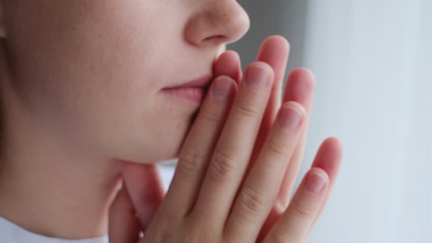Close up of thoughtful depressed young woman touching chin, looking out of window, considering problem solution or feeling stressed of difficult life situation, suffering from negative thoughts alone | Shutterstock HD Video #1108267563