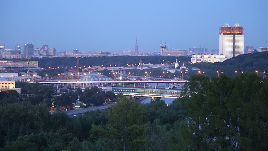 View of central Moscow from Sparrow Hills or Vorobyovy Gory observation (viewing) platform at night-- is on a steep bank 85 m above the Moskva river, or 200 m above sea level. Moscow, Russia