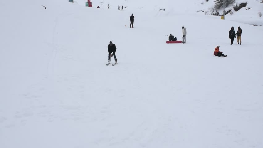 Mature man skiing on slope in snow, auli, uttarakhand, india. Royalty-Free Stock Footage #1108269667