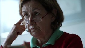 Senior woman close-up face listening to person speak off-camera, candid elderly lady in conversation with friend, candid and authentic interaction - Powered by Shutterstock - Get 15% off with code: PIKWIZARD15