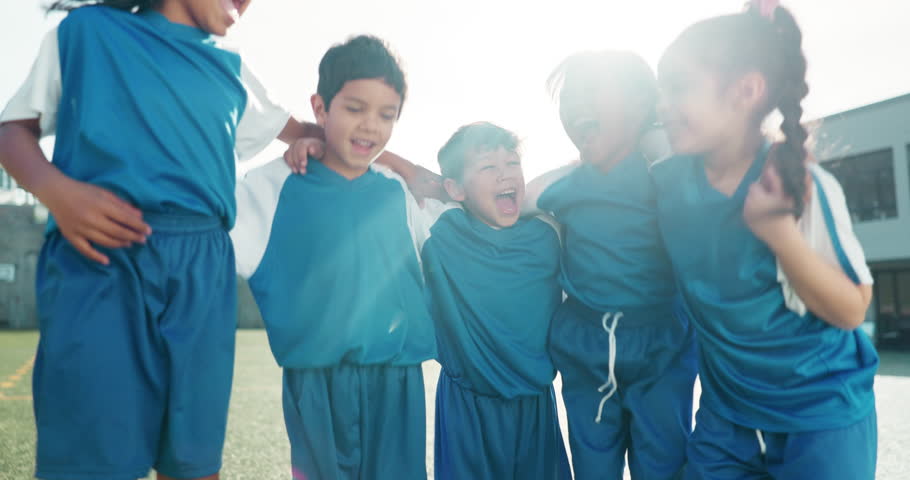 Kids, soccer and jump in team celebration for winning, victory or motivation together on outdoor grass. Excited children hug or huddle in teamwork, victory or competition in support, fitness or sport Royalty-Free Stock Footage #1108281839