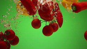 Mixed Vegetables Falling in Water in Slow Motion on Green - Powered by Shutterstock - Get 15% off with code: PIKWIZARD15