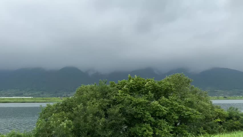 Cloudy day on a moving river in Japan