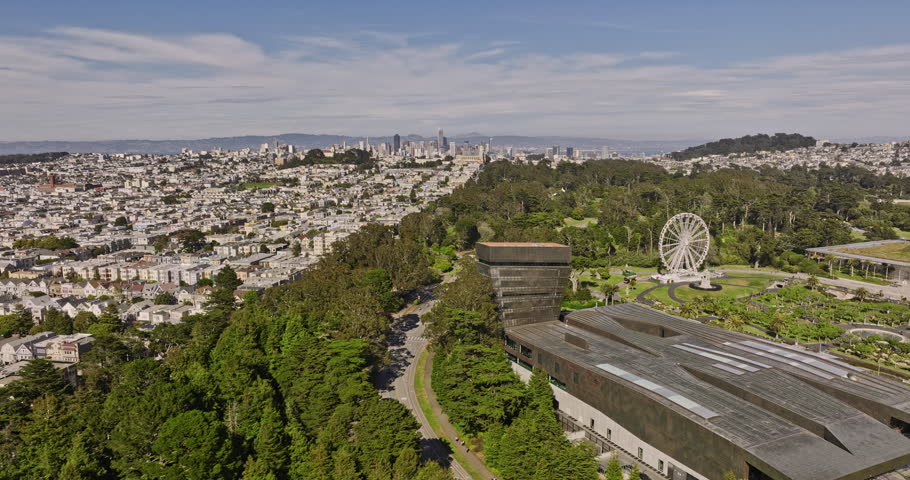 San Francisco California Aerial v180 fly around golden gate park capturing de young museum and academy of sciences building block and surrounding neighborhoods - Shot with Mavic 3 Cine - June 2022 Royalty-Free Stock Footage #1108293937