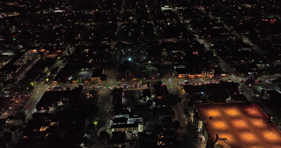 San Jose California Aerial v6 cinematic low birds eye view flyover horace mann along santa clara street capturing illuminated busy downtown cityscape at night - Shot with Mavic 3 Cine - June 2022
