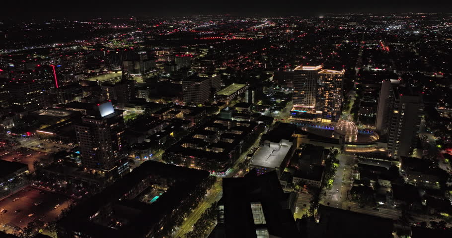 San Jose California Aerial v4 cinematic birds eye view drone flyover downtown capturing illuminated cityscape and buzzing streets at night from above - Shot with Mavic 3 Cine - June 2022