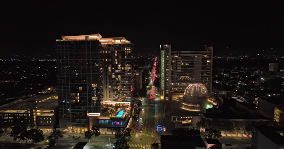 San Jose California Aerial v8 fly straight above santa clara street in between high rise buildings capturing shimmering glass window and horace mann neighborhood - Shot with Mavic 3 Cine - June 2022