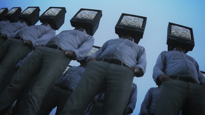 Brainwashed. Surreal army of tv head people standing in line. Media manipulation concept. Totalitarian controlled society symbol. Scary future sci-fi video loop. Total invigilation, fake news.