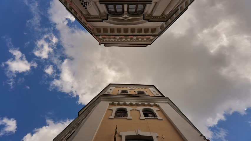 Historical building in Grodno, Belarus.  Two old water towers on the background of clouds. Timelapse video clouds float with a view of a beautiful building.
