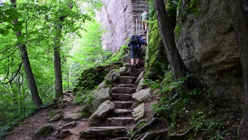 Mountain rock steps woodland people walking up, hiking fall season activity, Rimrock Pa Allegheny state forest