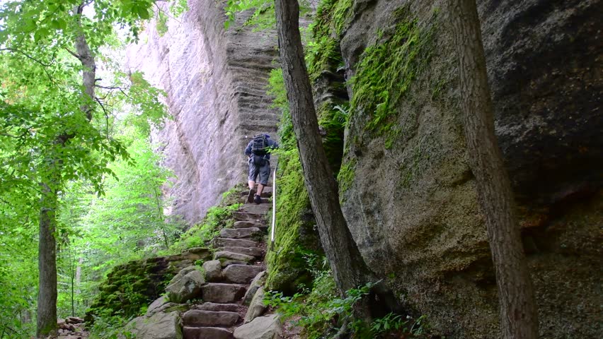 Mountain rock steps woodland people walking up, hiking fall season activity, Rimrock Pa Allegheny state forest