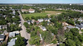 Aerial video of Sutherland neighborhood, Saskatoon, SK, Canada, showcasing residential areas, streets, and landscapes. A vivid portrayal of suburban living.