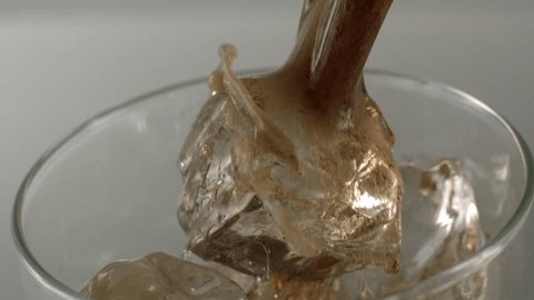 Why do ice cubes crack in drinks? (SLOW MOTION) 