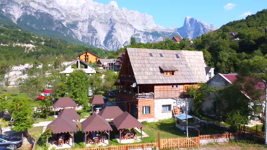 Aerial drone panning of the valley of Theth National Park, Albania. Albanian Alps