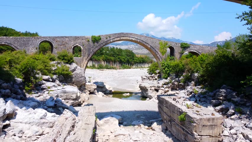 Drone view inside the Old Mes Ottoman Bridge near Shkoder. Albania, Europe. Ura e Kadiut Royalty-Free Stock Footage #1108330915