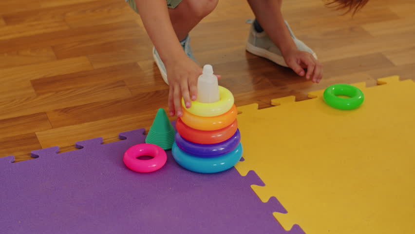 A preschool teacher's colorful classroom is where kids embark on a journey of language development and joyful education Royalty-Free Stock Footage #1108332381