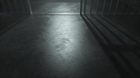 A slow camera pan closeup showing a dimly lit concrete floor of a prison cell and the cast shadows of the jail cell door slamming shut - Powered by Shutterstock - Get 15% off with code: PIKWIZARD15