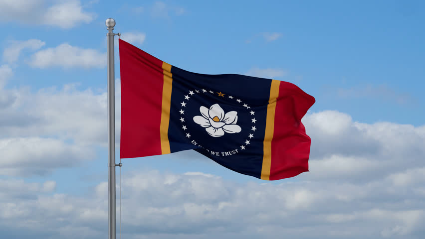 Mississippi US state looped flag waving in the wind with blue sky and running clouds, cycle seamless loop video
