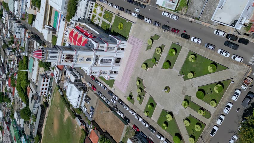 Vertical drone shot Showing famous cathedral Sacred Heart of Jesus in Moca during sunny day, Dominican Republic 