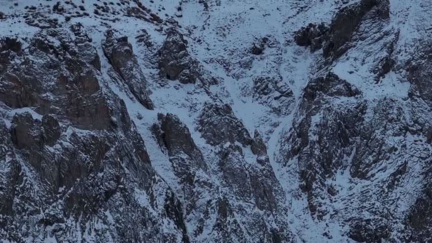 Aerial rising shot establishing shot of the El Colorado ski resort and mountainside