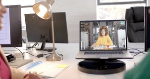Laptop with video call with african american businesswoman on screen. Online connections, business and networking concept.