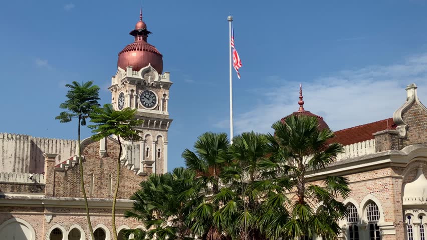 Sultan Abdul Samad building during a blue sky sunny day at Merdeka Independence square in Kuala Lumpur, Malaysia.