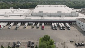 Aerial Panorama of Multiple Semi-Trucks Parked at Warehouse Loading Dock - Powered by Shutterstock - Get 15% off with code: PIKWIZARD15