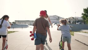 Children actively spend day in skatepark. group of friends are engaged scooter park roller skates, skateboard. Friends gathered in park. Children have fun outdoors on roller skates, skateboard, - Powered by Shutterstock - Get 15% off with code: PIKWIZARD15