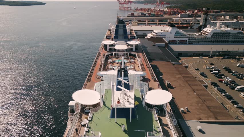 Cruise ship in Halifax harbor, Canada. New Scotia main cruise ship terminal Aerial view. Drone shot on cruise liners in the port just arrived s city with tourists.