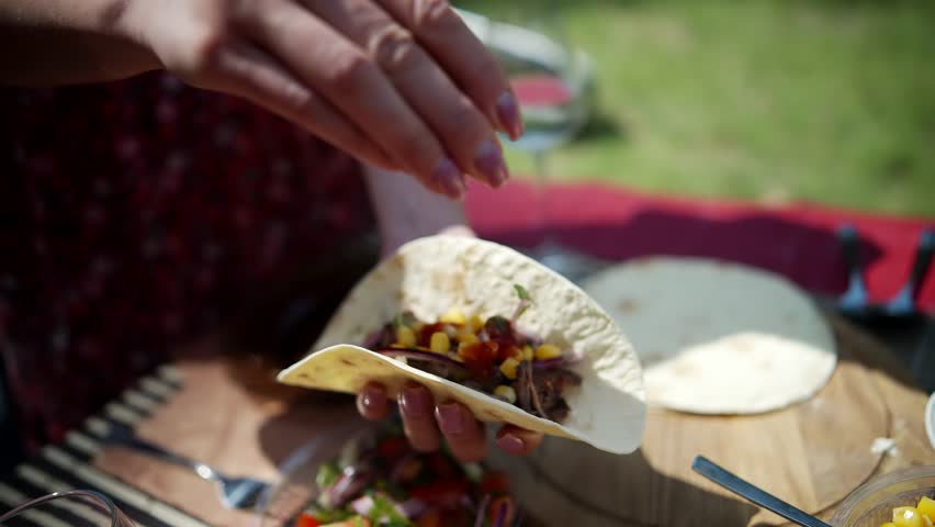 Tasty Mexican Tacos Filled Meat. Homemade American Soft Shell Beef Tacos. Mexican Food Burrito. Tortilla Fast Food. Mexican Pork Carnitas Tacos Fajitas. American Taco Salsa Corn Tortilla Carne Asada Royalty-Free Stock Footage #1108394137