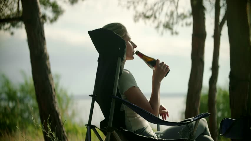 Cool Refreshment Wheat 
Beer. Beer Lover Leisure Time. Weekend Chill Drinking Beer. Cool Refreshment Serene Atmosphere. Pale Ale Beer Lover Chilled Beverages Tranquil Retreat. Calm Sunset Celebration Royalty-Free Stock Footage #1108394149