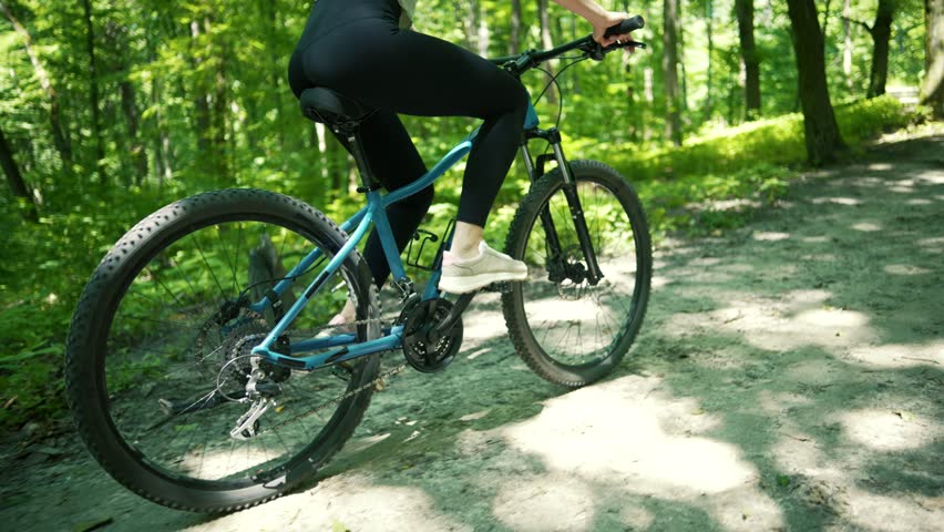 Sport Woman Riding Bicycle In Public Park. Cyclist Healthy Lifestyle Training Plan MTB Bike Cycling Workout Sport Recreation. Athlete Fit Girl In Sportswear MTB Fitness Exercise Cycling Workout Biking Royalty-Free Stock Footage #1108394183