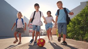children near the school playing soccer. kids a school education kid dream concept. a group of children near the lifestyle school playing ball. a group of school children playing - Powered by Shutterstock - Get 15% off with code: PIKWIZARD15