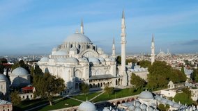 A breathtaking flypast view showcasing the iconic Suleymaniye Mosque in Istanbul, Turkey. Its distinctive minarets pierce the skyline, exuding historical significance and architectural brilliance