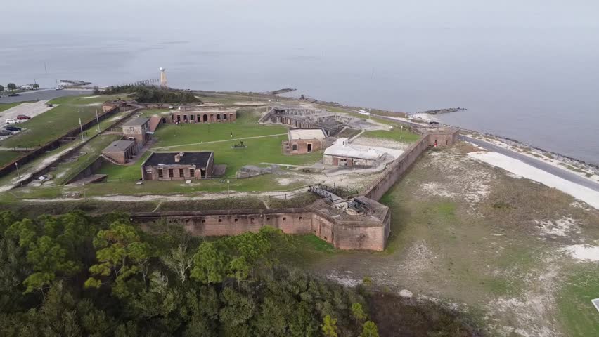 An aerial of the historic Fort Gaines in Alabama on the shore with the bay in the background