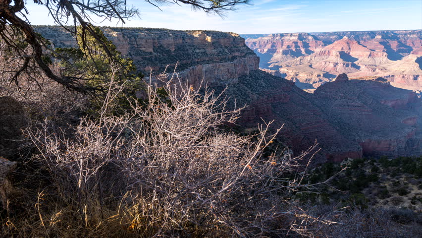 A day to night time lapse over the village at Grand Canyons south rim overlook