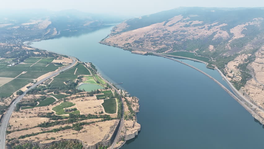 The Columbia River Gorge is a federally protected scenic area forming the boundary between Washington and Oregon. The scenic area is a popular area for hiking, biking, fishing, and water sports.