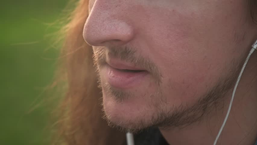 Close up man blowing smoke | Shutterstock HD Video #1108422477
