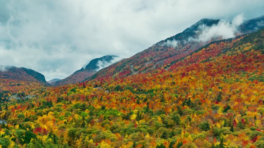 Beautiful Autumn foliage timelapsing aerial view with stunning nature colors from Adirondack upper New York State, USA