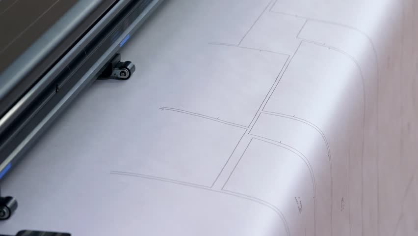 Close-up large plotter prints on whatman paper. Print patterns for sewing on paper using a large printer. Royalty-Free Stock Footage #1108442745
