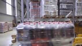 Beverage Drinks at Pallets in Shelves Rows Aisles Distribution Warehouse Drive