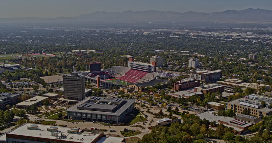Salt Lake City Utah Aerial v56 panoramic view low level drone flyover university campus overlooking at rice eccles stadium and beautiful mountinscape - Shot with Inspire 2, X7 camera - October 2021 Royalty-Free Stock Footage #1108455791