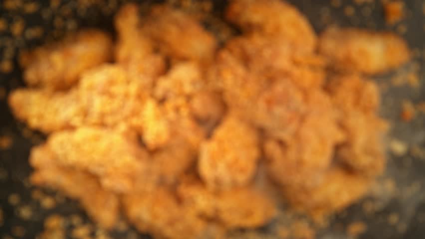 Super Slow Motion Shot of Flying Hot Chicken Wings Towards Camera at 1000fps. Royalty-Free Stock Footage #1108461539